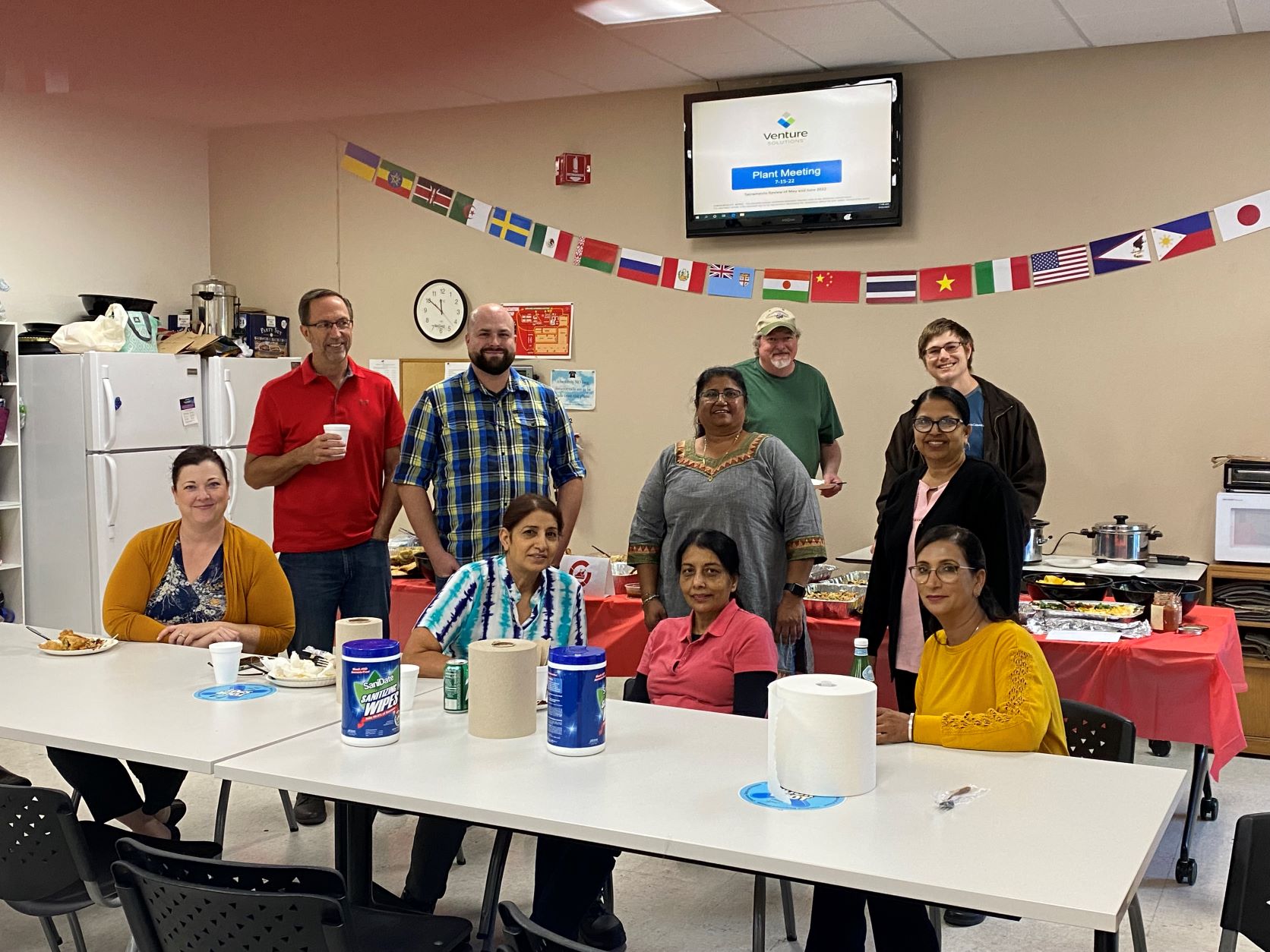 Sacramento employees gather in the breakroom for the multicultural potluck